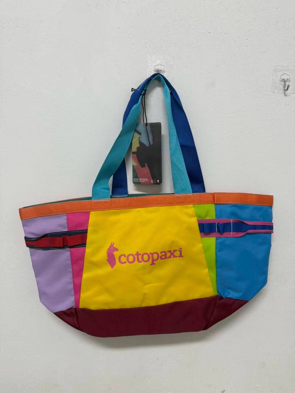 cotopaxi Multicolor Tote Bag with Yellow Center and Blue Straps
